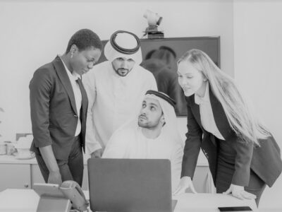 Multiracial group of business people having a meeting in a office - Teamwork in the office, business meeting in the UAE